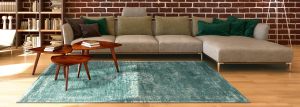 Green Louis De Poortere Rugs available from Southport Carpet Centre