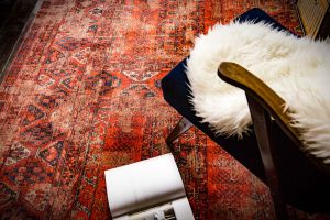 Red Louis De Poortere Rugs available from Southport Carpet Centre