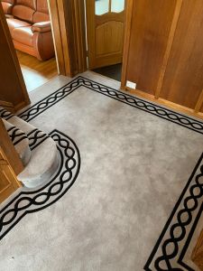 Bespoke & Hand Carved Carpet from Southport Carpet Centre : 70 oz wool saxony in Harbour Mist grey with contrasting black borders in a chain design